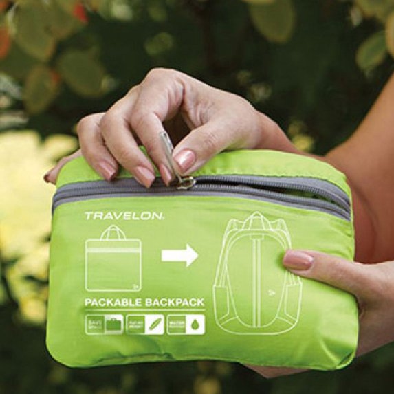 Lett ryggsekk med integrert lomme og 2 sidelommer